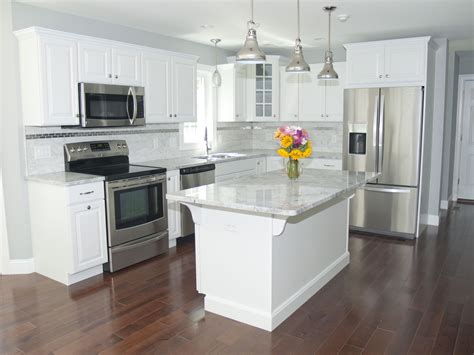 antique white cabinets with stainless steel appliances|remodeled kitchens with white appliances.